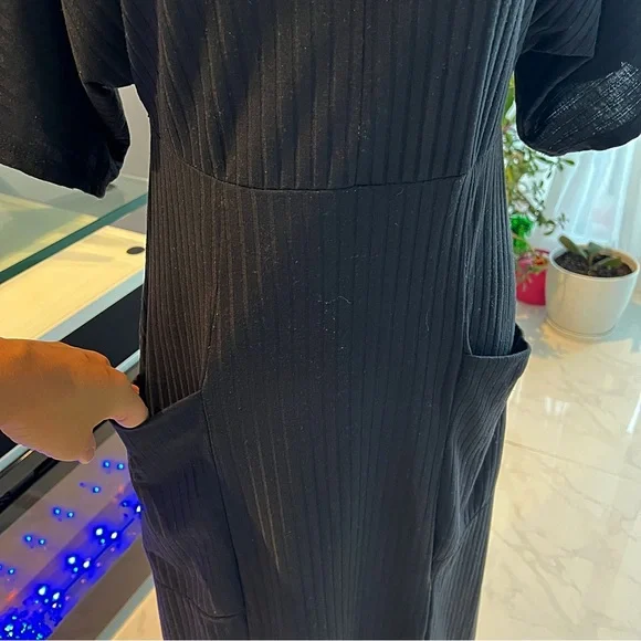 Rolla Coster Plunging Black Wrap Dress with
Flutter Sleeve Size: L - Picture 5 of 16